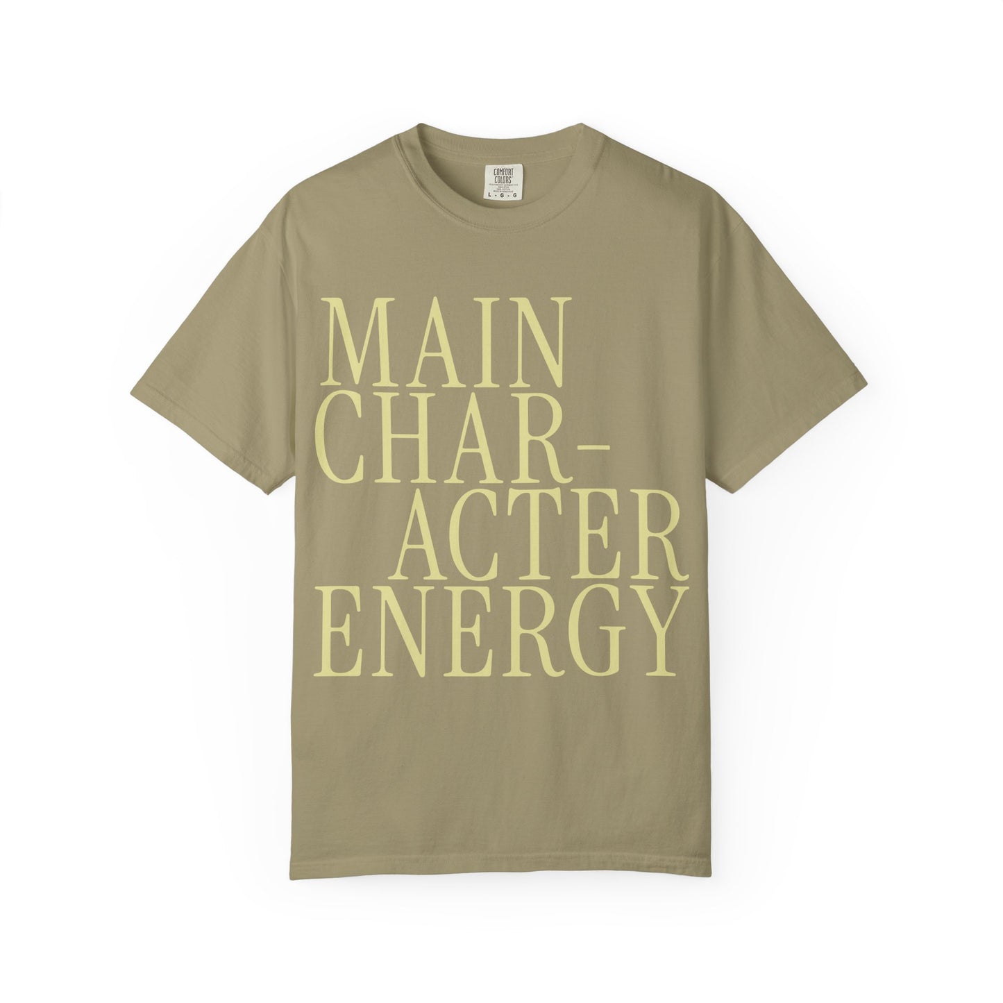 Khaki t-shirt with 'MAIN CHARACTER ENERGY' text on a white background